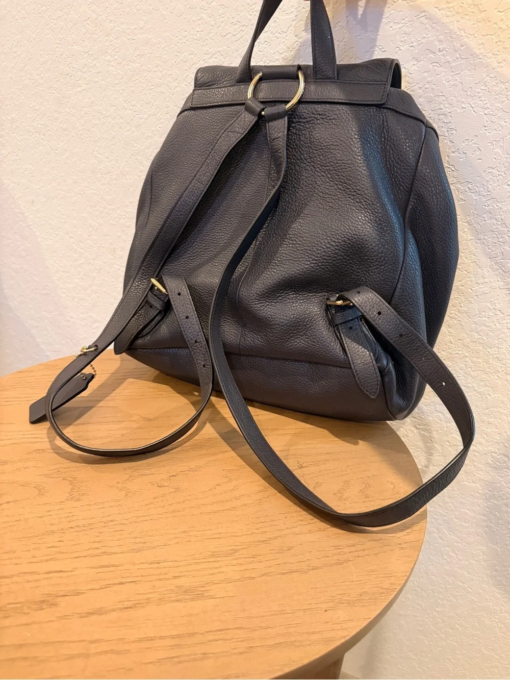COACH Black Pebbled Leather Drawstring Backpack with Front Pockets